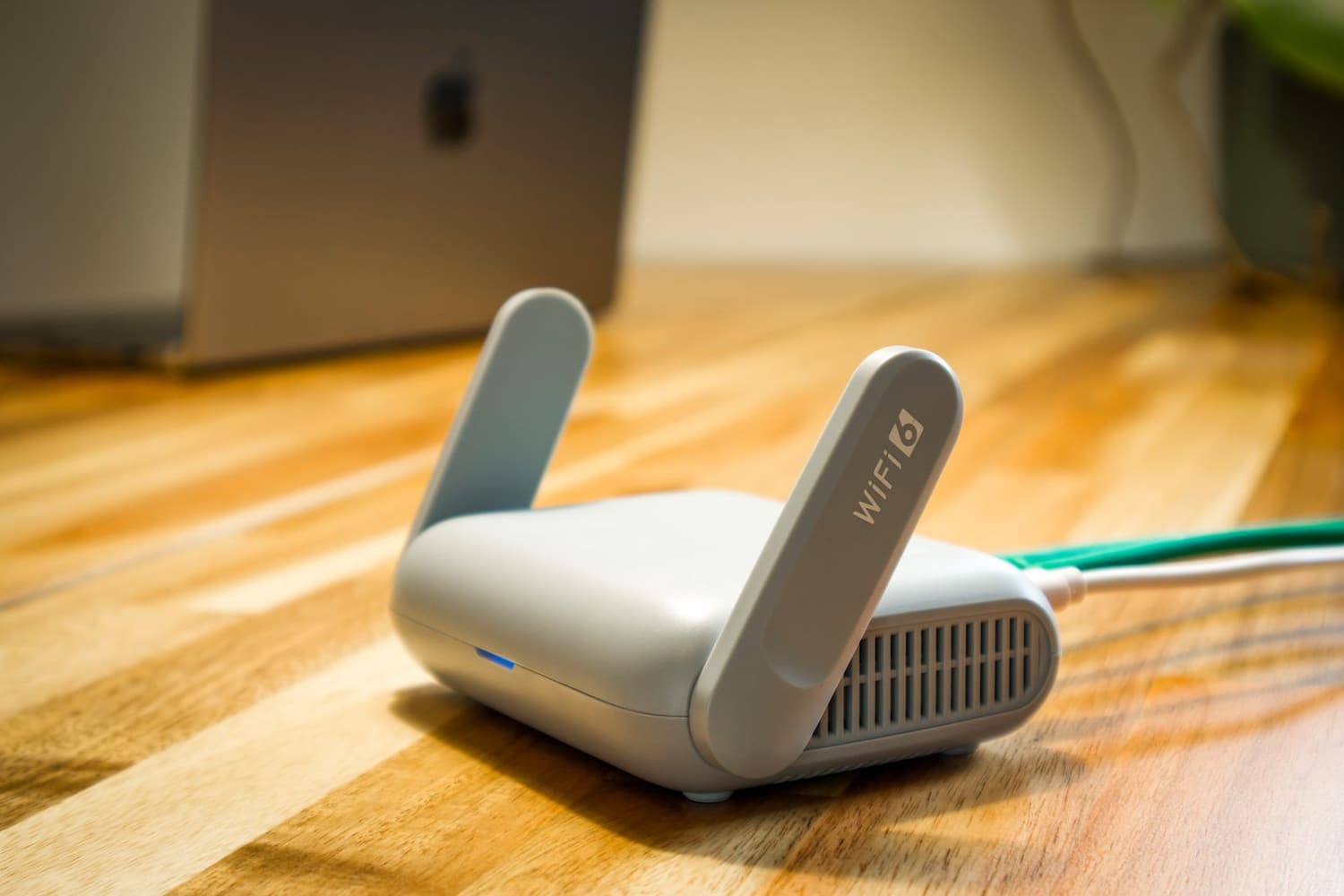 Wireless access point cleanly installed on the ceiling of a large Utah home